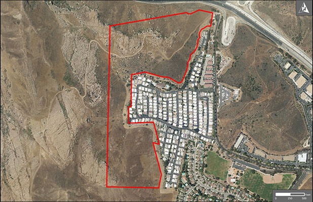 Aerial view of Vallecito Open Space bordering housing development